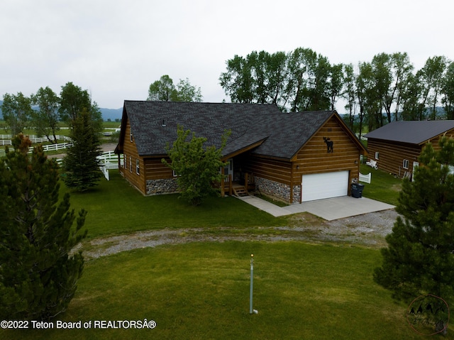 log home featuring a front yard