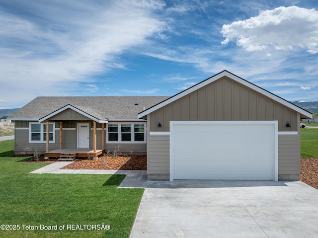 3829 Spruce Rd, Driggs, ID 83422 - single story home featuring driveway, a shingled roof, a front lawn, and board and batten siding
