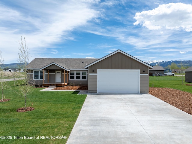 3829 Spruce Rd, Driggs, ID 83422 - ranch-style home with driveway, a garage, a front yard, a mountain view, and board and batten siding