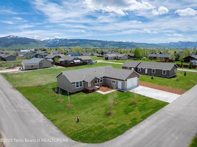 3829 Spruce Rd, Driggs, ID 83422 - aerial view of residential area with mountains
