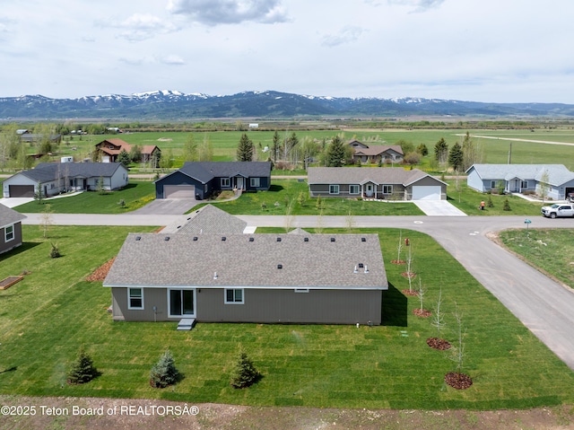 3829 Spruce Rd, Driggs, ID 83422 - aerial view of sparsely populated area featuring a mountain backdrop and nearby suburban area