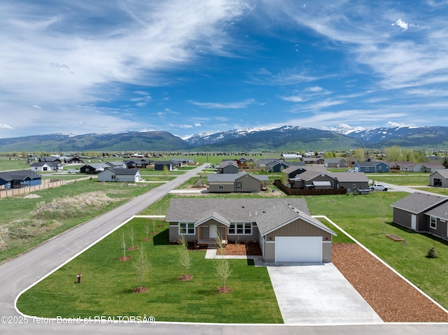 3829 Spruce Rd, Driggs, ID 83422 - aerial view of residential area with a mountain backdrop
