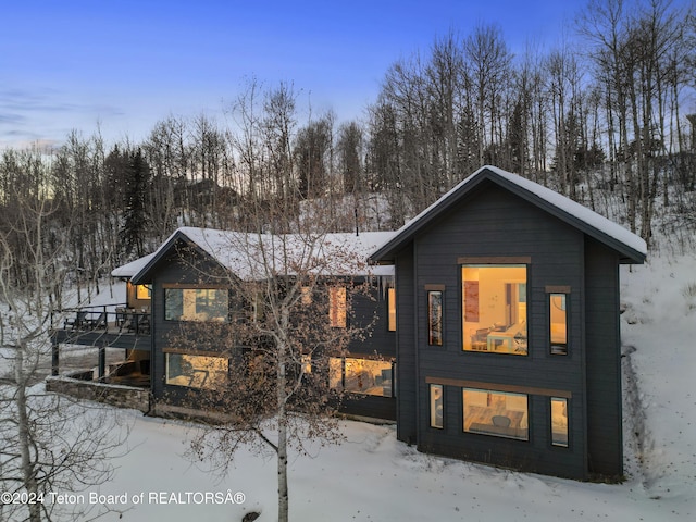 view of snow covered property