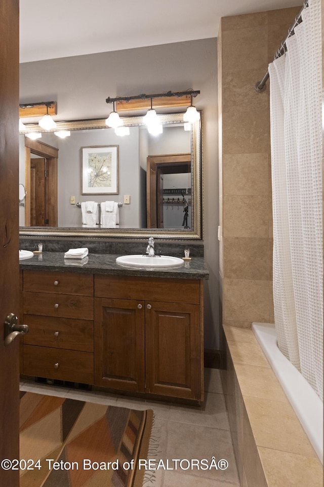 bathroom featuring tile patterned floors and vanity