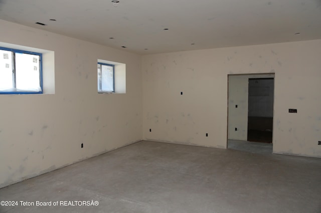 unfurnished room with plenty of natural light