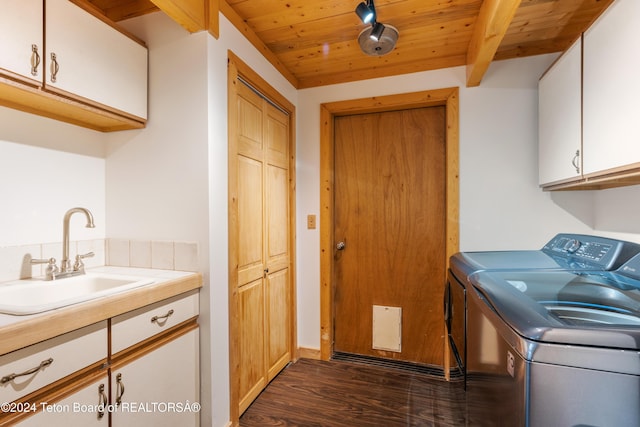 washroom with cabinets, wood ceiling, sink, washer and dryer, and dark hardwood / wood-style floors