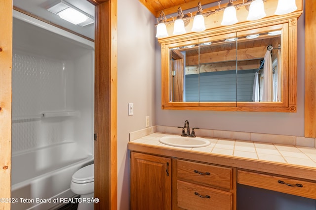 full bathroom with vanity, toilet, and tub / shower combination