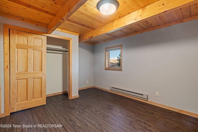 unfurnished bedroom with baseboard heating, beamed ceiling, wood ceiling, and dark hardwood / wood-style floors