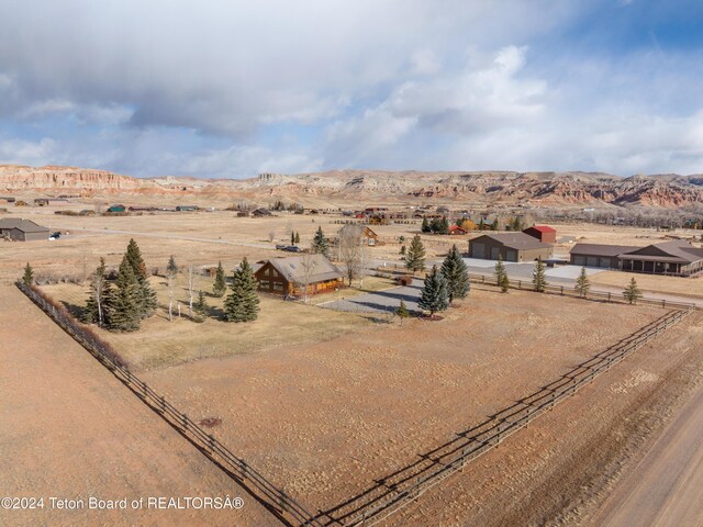 aerial view featuring a mountain view and a rural view