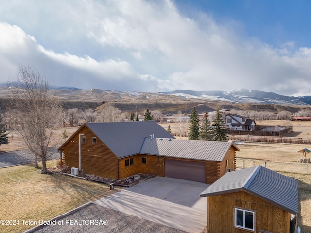 exterior space featuring a mountain view