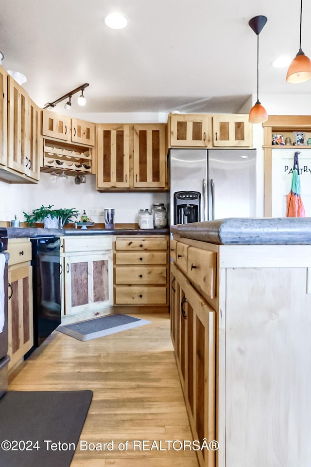 kitchen featuring pendant lighting, light brown cabinets, light hardwood / wood-style flooring, dishwasher, and stainless steel fridge with ice dispenser