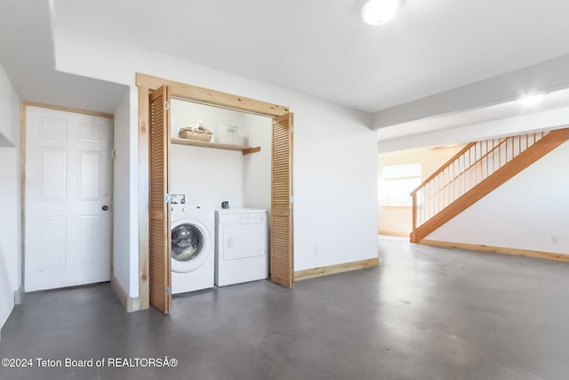 washroom with separate washer and dryer