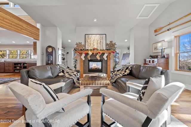 3470 W Mccollister Dr, Teton Village, WY 83025 - living area with plenty of natural light, light wood-type flooring, a glass covered fireplace, and recessed lighting