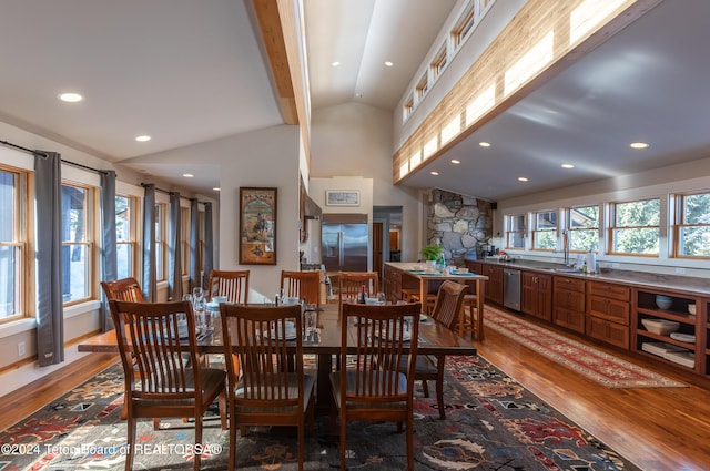 3470 W Mccollister Dr, Teton Village, WY 83025 - dining room featuring light wood-style flooring, vaulted ceiling, and recessed lighting