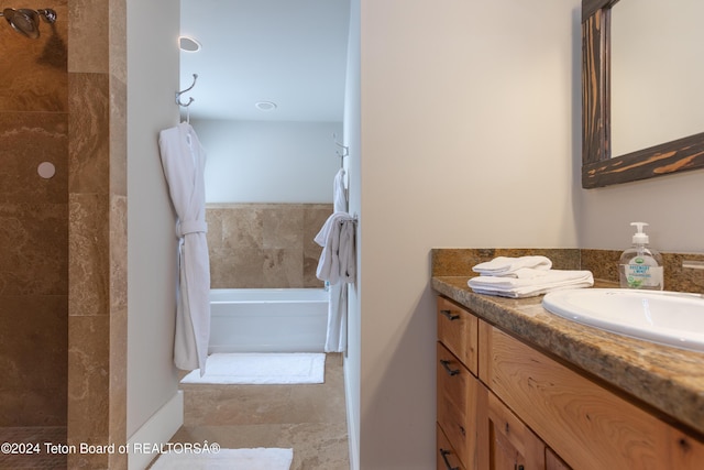 3470 W Mccollister Dr, Teton Village, WY 83025 - bathroom with vanity, tiled shower, and a bath
