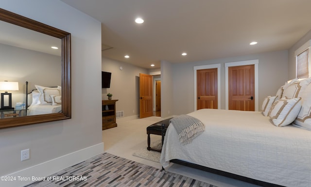 3470 W Mccollister Dr, Teton Village, WY 83025 - carpeted bedroom with recessed lighting and multiple closets