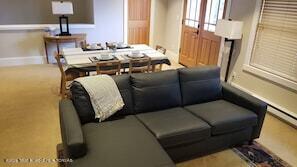 3470 W Mccollister Dr, Teton Village, WY 83025 - living area featuring baseboards and carpet