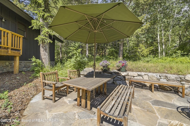 3470 W Mccollister Dr, Teton Village, WY 83025 - view of patio / terrace with outdoor dining area