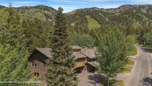 3470 W Mccollister Dr, Teton Village, WY 83025 - mountain view featuring a forest