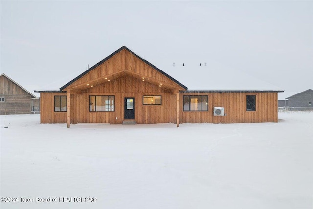 view of snow covered house