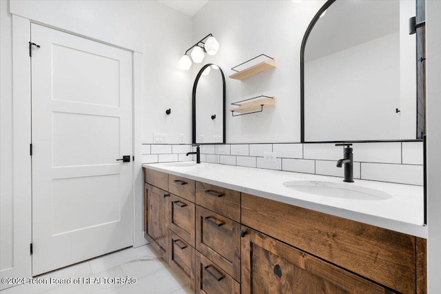 bathroom with decorative backsplash and vanity