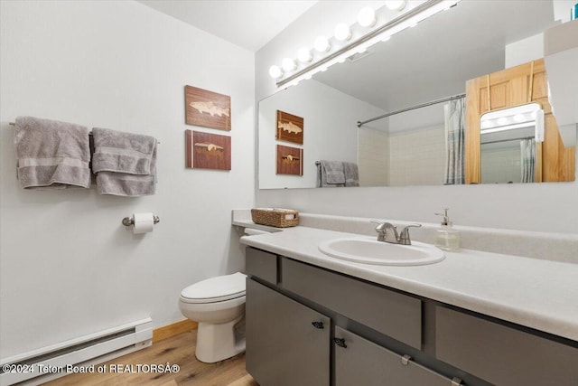 bathroom featuring hardwood / wood-style floors, vanity, a baseboard heating unit, a shower with shower curtain, and toilet