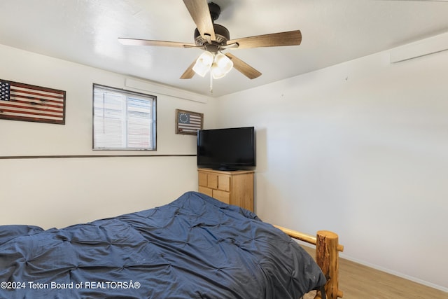 bedroom featuring ceiling fan and light wood-type flooring