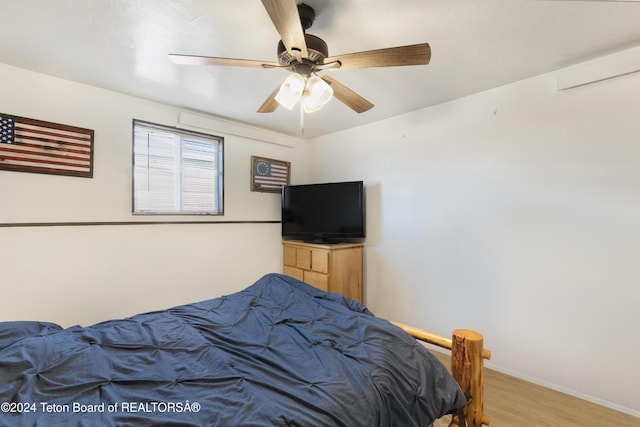 621 Mountain View Dr, Dubois, WY 82513 - bedroom with light wood-style floors and ceiling fan