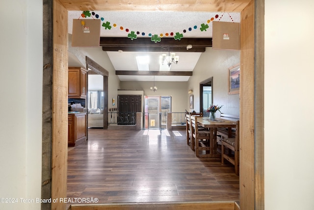 corridor featuring vaulted ceiling with beams, a chandelier, and dark hardwood / wood-style floors