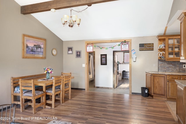 dining room featuring vaulted ceiling with beams, a notable chandelier, and dark wood-type flooring