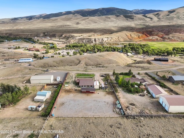 621 Mountain View Dr, Dubois, WY 82513 - aerial view of sparsely populated area featuring a mountain backdrop