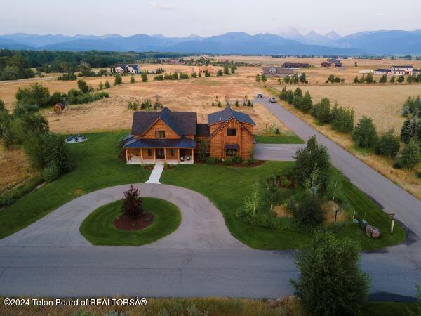 bird's eye view with a mountain view