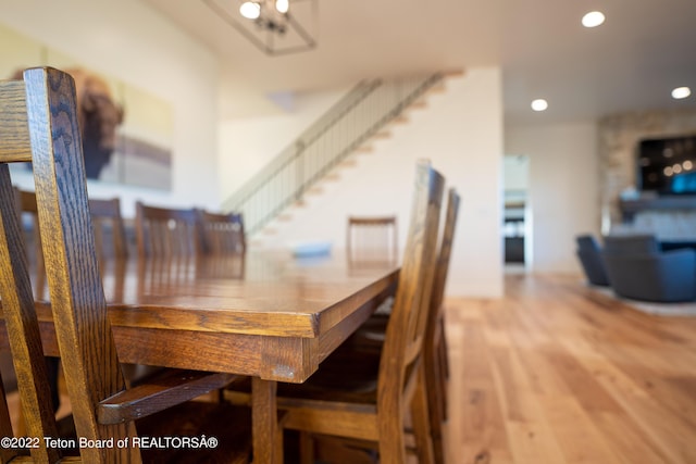 dining space featuring wood-type flooring