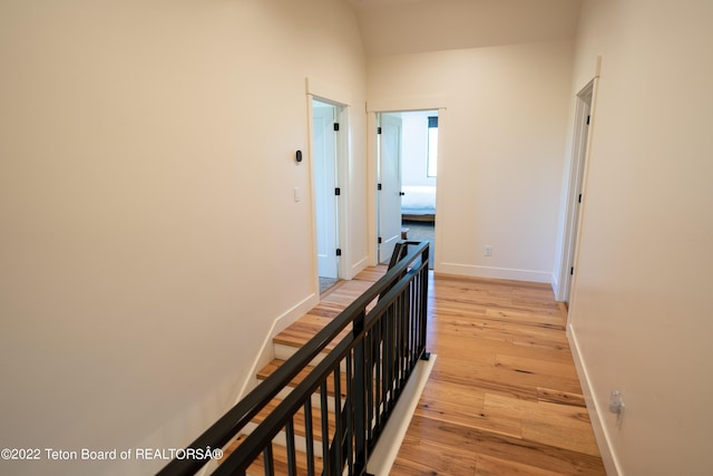 hallway with light wood-type flooring