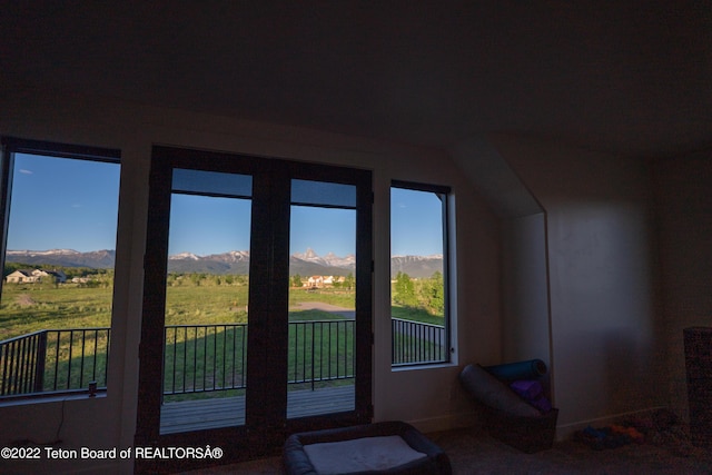 additional living space with a mountain view