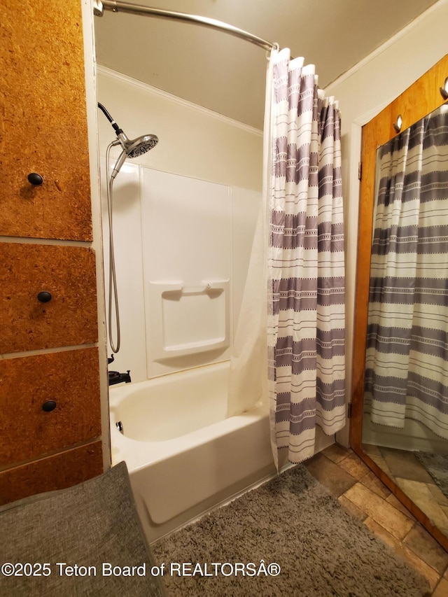 bathroom featuring shower / bath combo with shower curtain