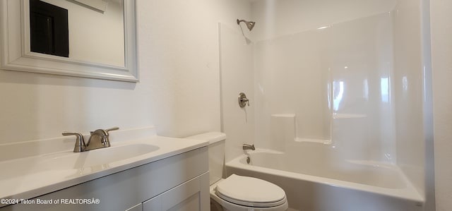 full bathroom with vanity, shower / bath combination, and toilet