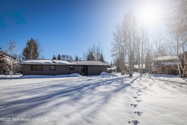 view of snow covered property