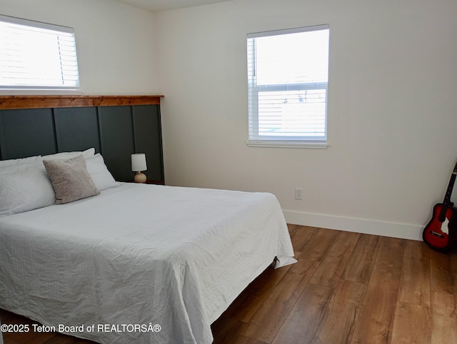 bedroom featuring hardwood / wood-style flooring