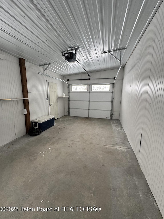 garage featuring a garage door opener