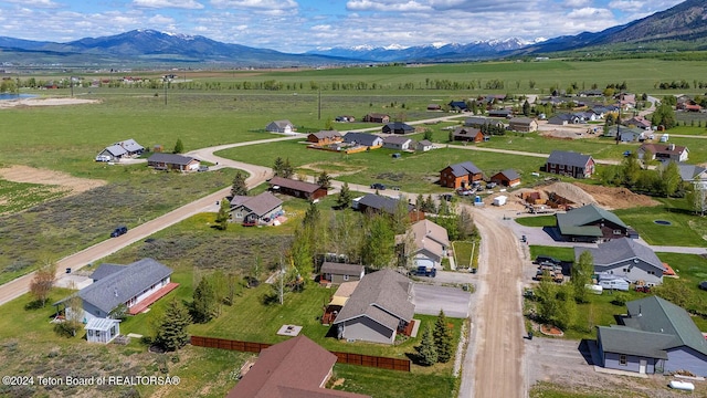 drone / aerial view featuring a mountain view