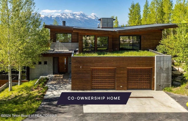 contemporary home featuring a mountain view