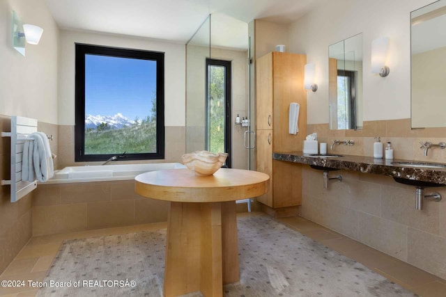 bathroom featuring tile patterned floors and plus walk in shower