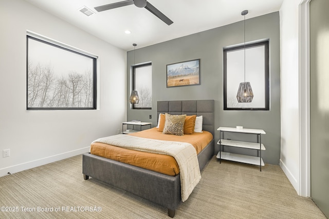 carpeted bedroom featuring ceiling fan