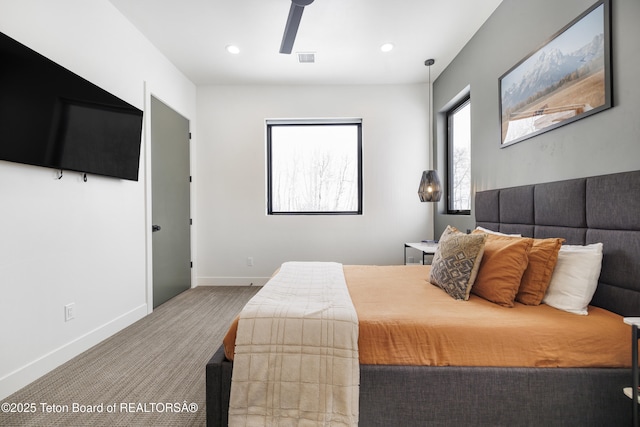 carpeted bedroom with ceiling fan