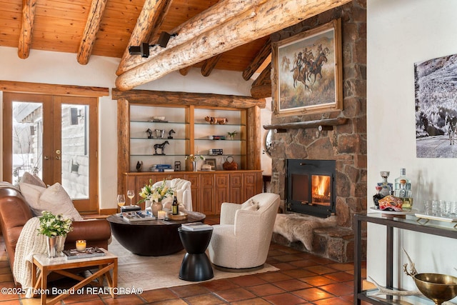 living area with wooden ceiling, vaulted ceiling with beams, tile patterned flooring, french doors, and a fireplace