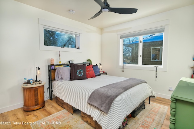 bedroom featuring ceiling fan and hardwood / wood-style floors