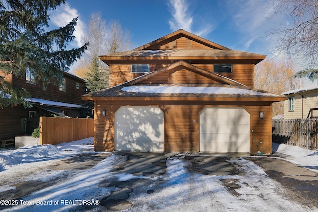 view of front of property with a garage