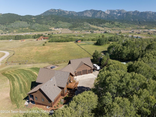 bird's eye view with a rural view and a mountain view