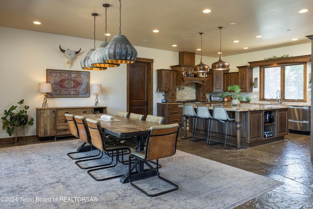 dining room featuring sink